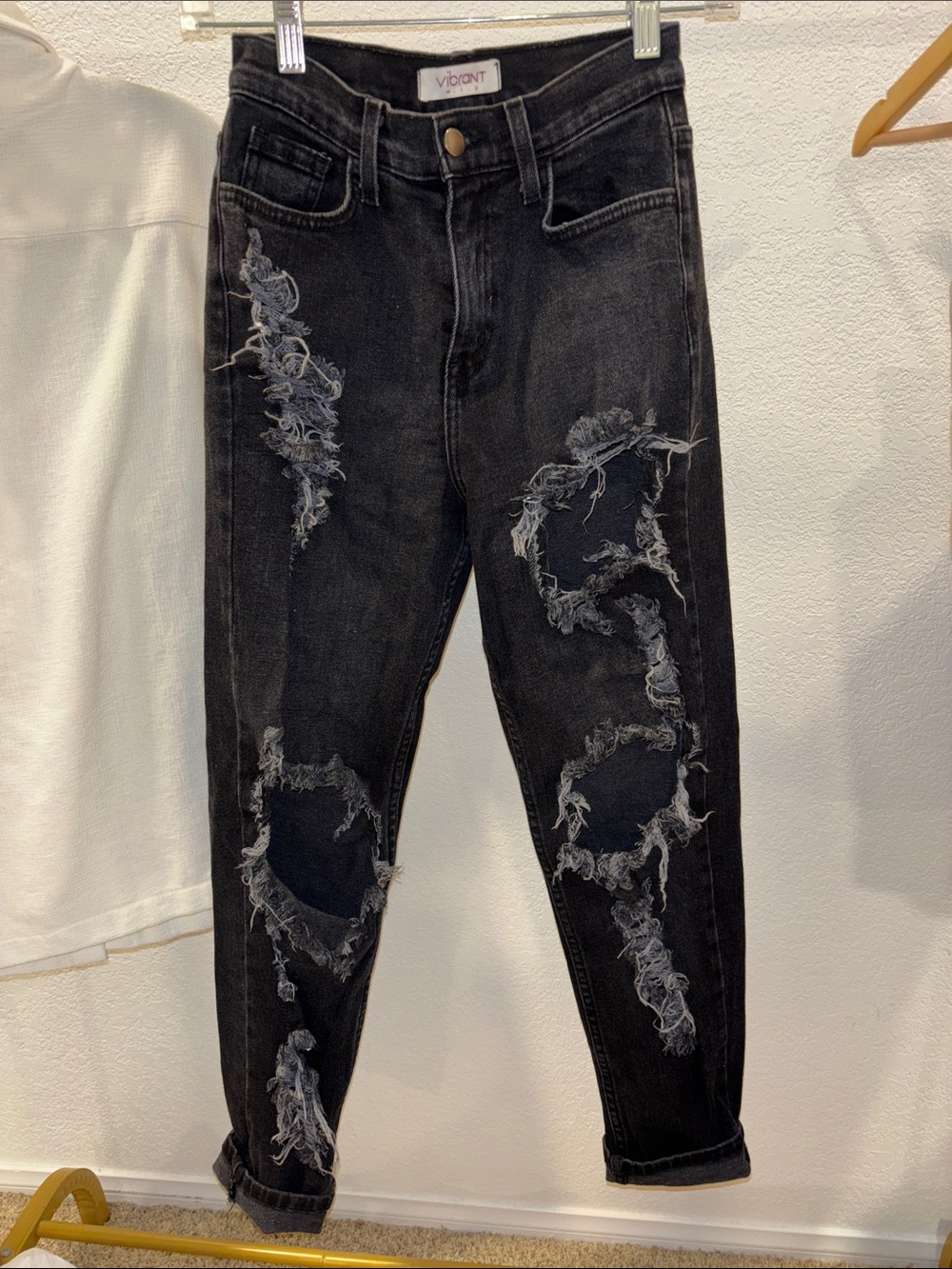 Vibrant Black Distressed Ankle Jeans